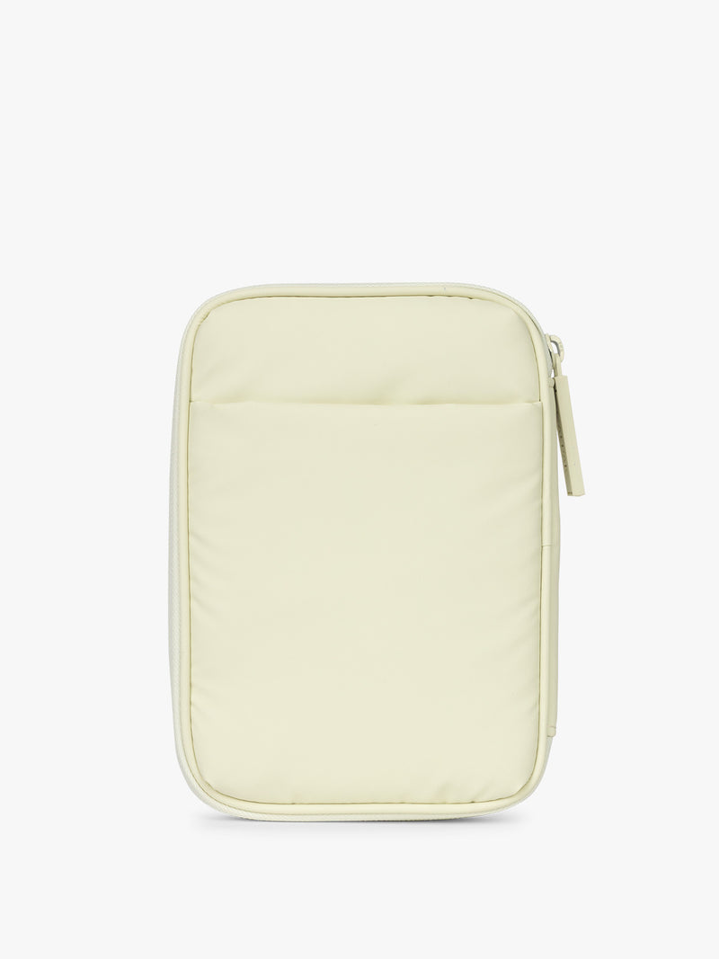 Back side of CALPAK Luka Zip Passport Wallet in light green Celadon