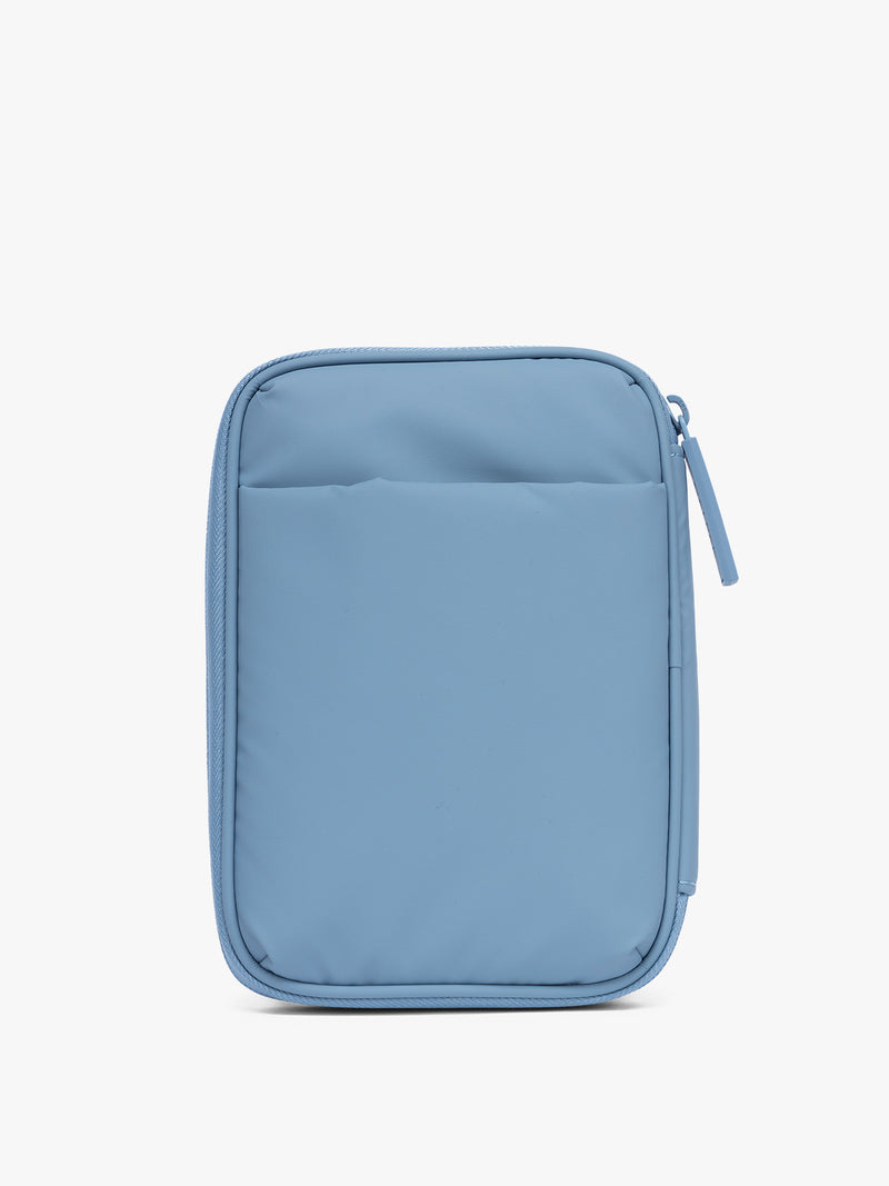 Backside of the CALPAK Luka Zippered Passport Wallet in light blue French Blue