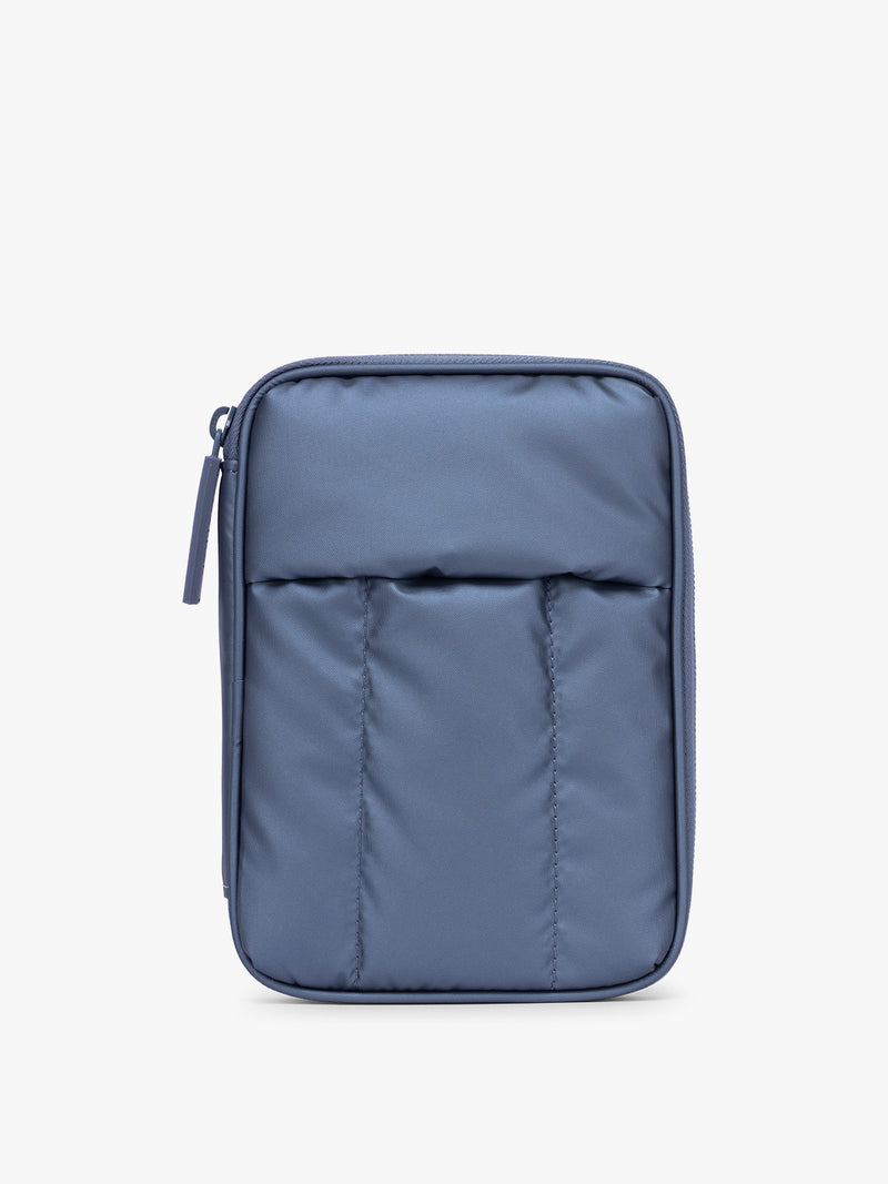 CALPAK Luka Zippered Passport Wallet in dark blue metallic material in Metallic Indigo