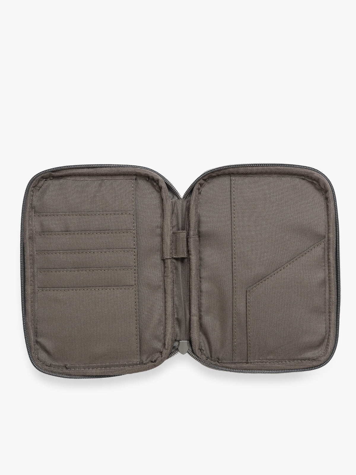 Opened view of a dark brown Mushroom CALPAK Luka Zip Passport Wallet in vegan leather with a zippered top and a front pocket, shown on a plain white background; PZW2301-MUSHROOM-PU