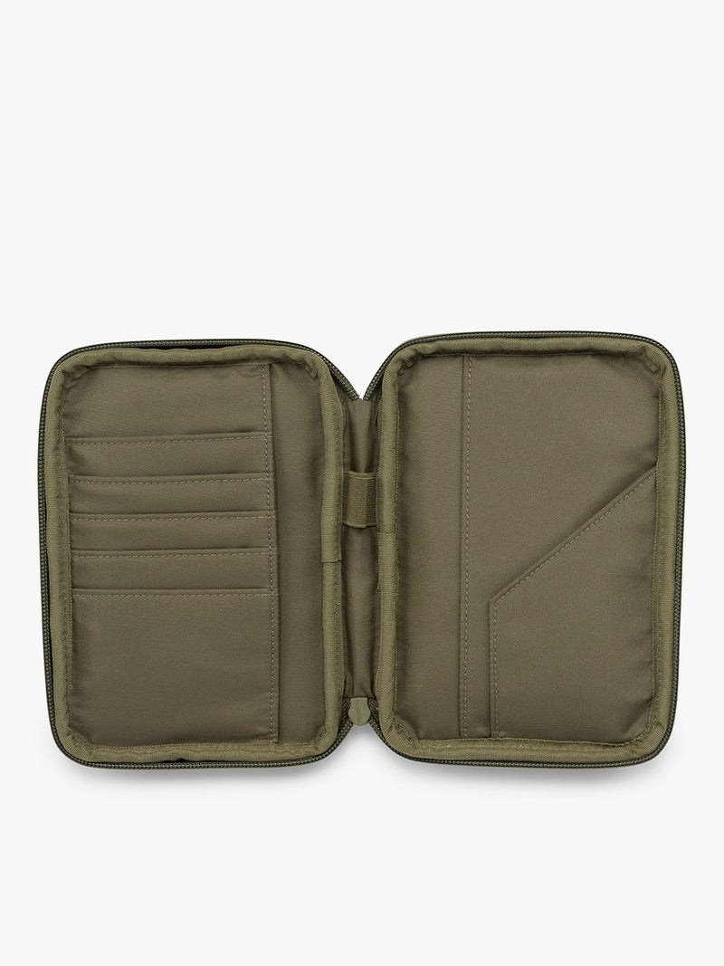 CALPAK Luka Zippered Passport Wallet in dark green Pine opened