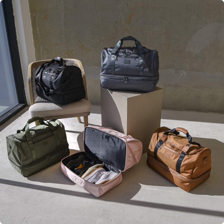 CALPAK Stevyn Duffel bags with bottom shoe compartment in a variety of colors