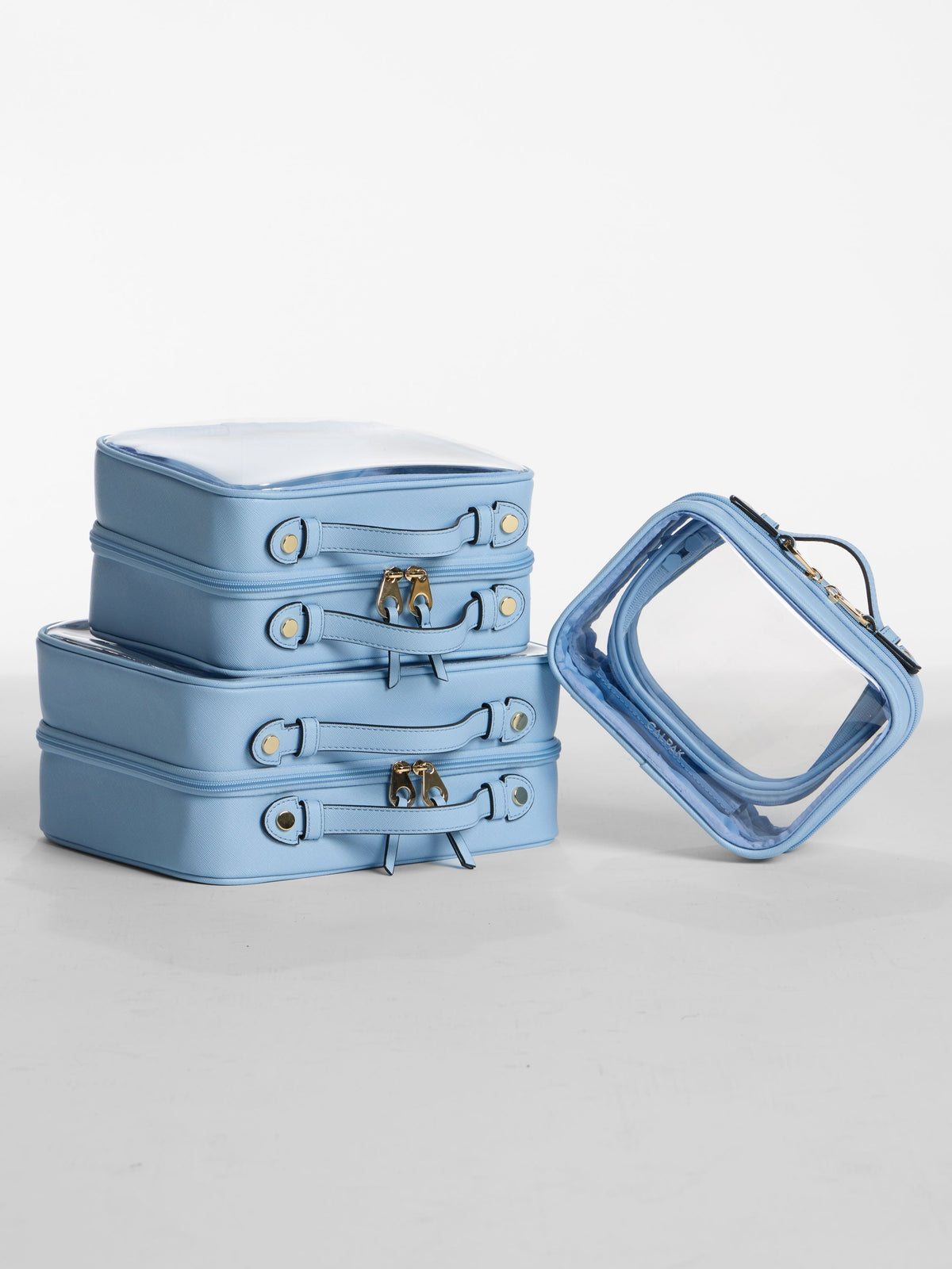 Blue CALPAK Clear Cosmetics Cases in small, medium and large; CCM2001-SKY