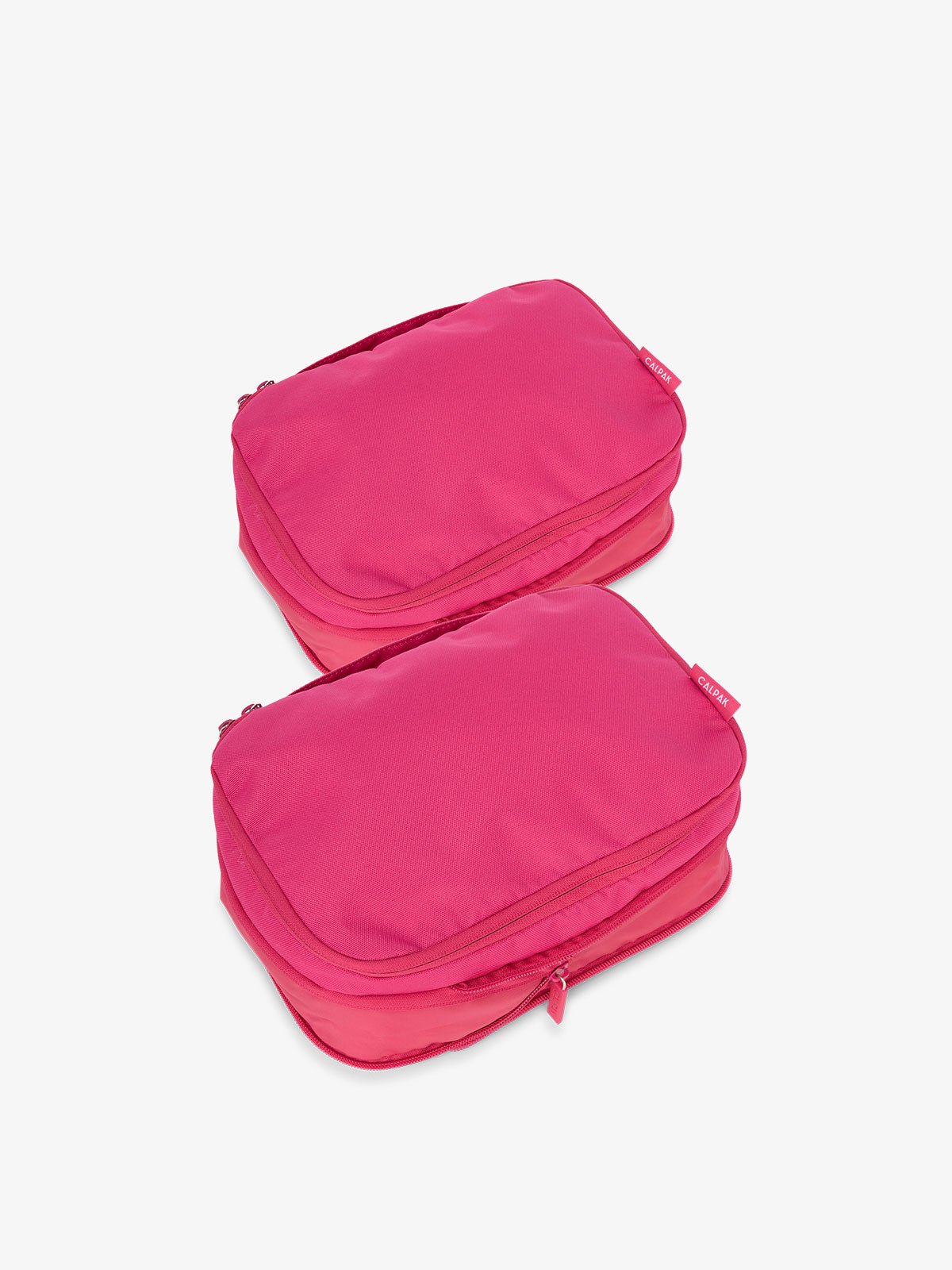 CALPAK small compression packing cubes with top handles and expandable by 4.5 inches in hot pink