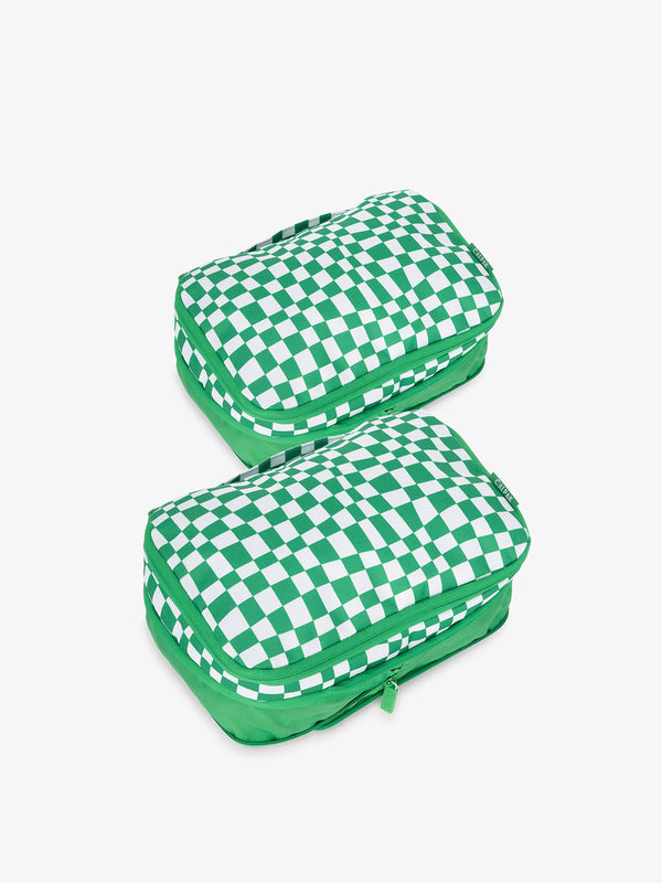 CALPAK small compression packing cubes with top handles and expandable by 4.5 inches in green checkered print