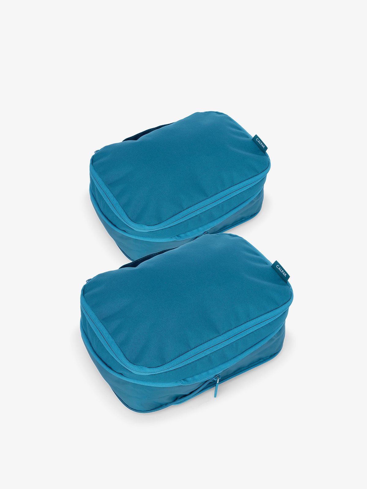 CALPAK small compression packing cubes with top handles and expandable by 4.5 inches in blue