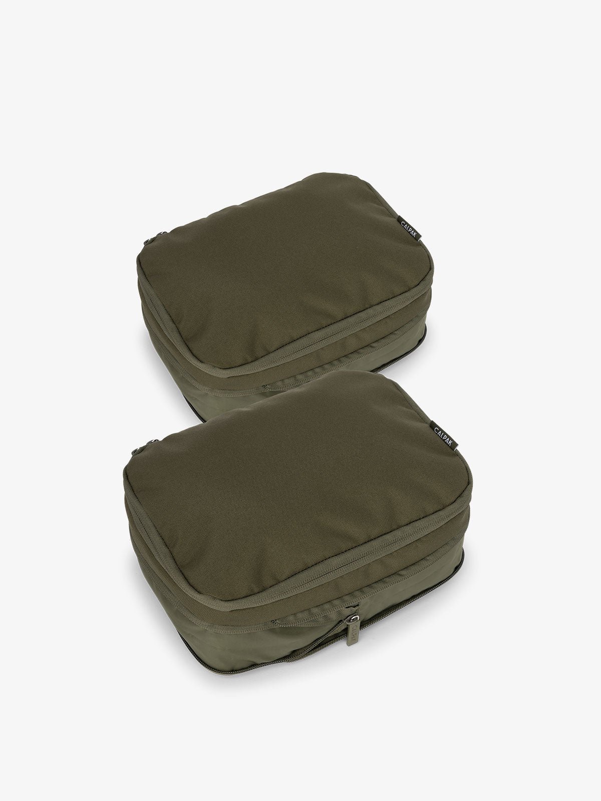 CALPAK small compression packing cubes with top handles and expandable by 4.5 inches in green
