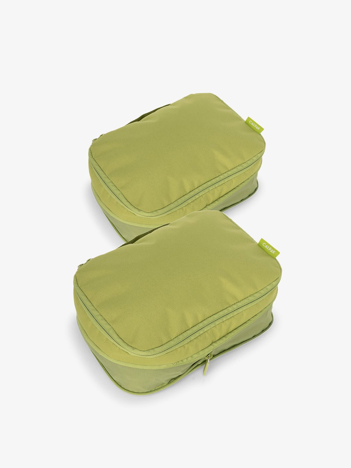 CALPAK small compression packing cubes with top handles and expandable by 4.5 inches in green