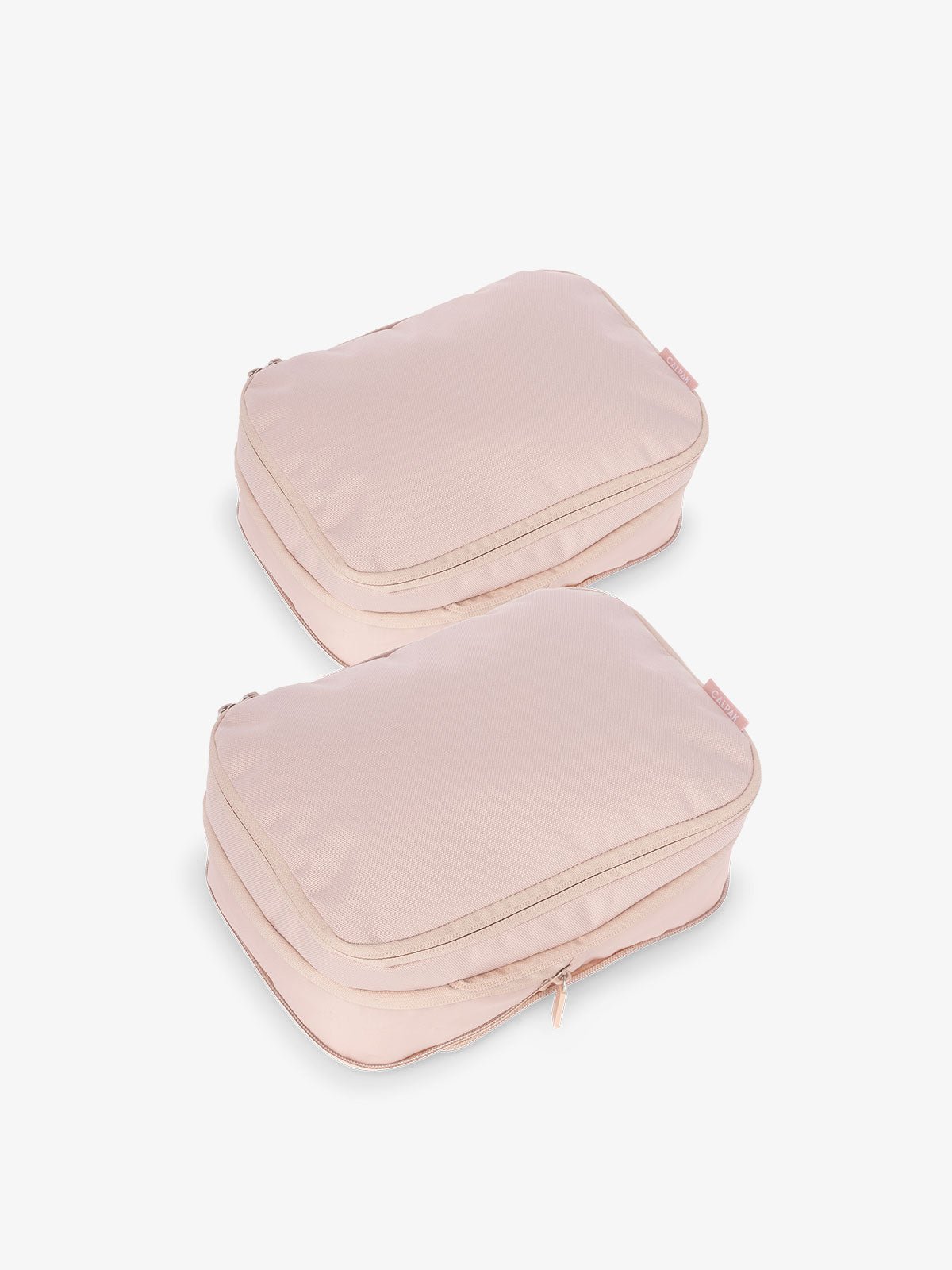 CALPAK small compression packing cubes with top handles and expandable by 4.5 inches in pink