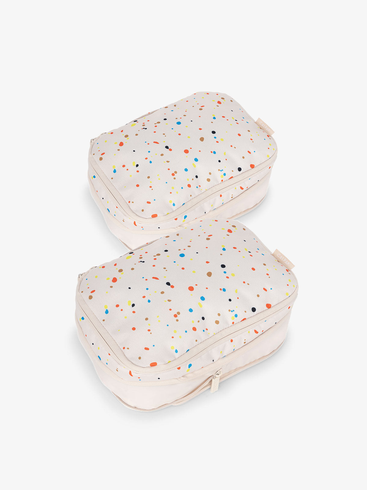 CALPAK small compression packing cubes with top handles and expandable by 4.5 inches in off-white and colorful speckle; PCS2301-SPECKLE