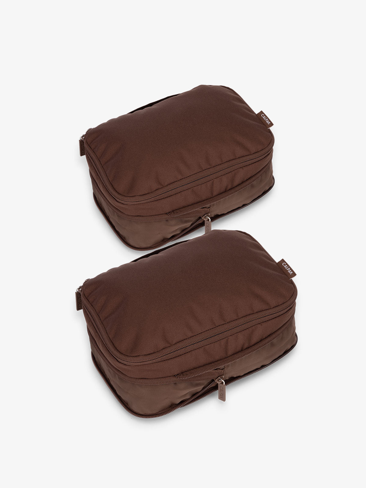 CALPAK small compression packing cubes with top handles and expandable by 4.5 inches in walnut brown; PCS2301-WALNUT