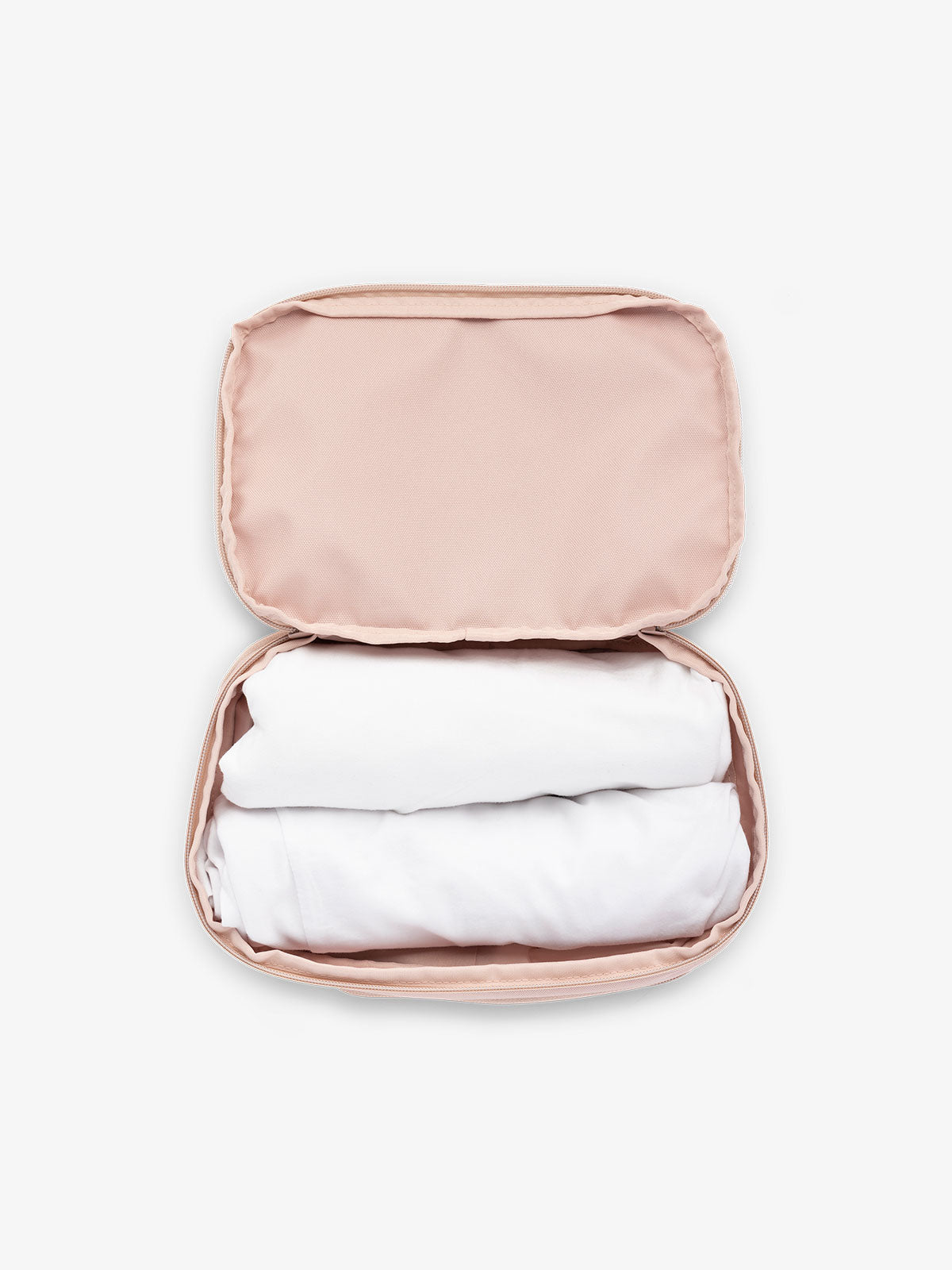 CALPAK small packing cubes for travel made with durable material in pink sand; PCS2301-PINK-SAND