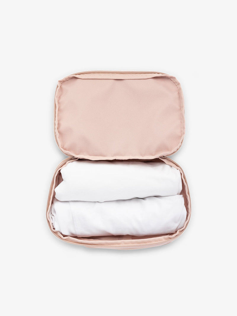 CALPAK small packing cubes for travel made with durable material in pink sand