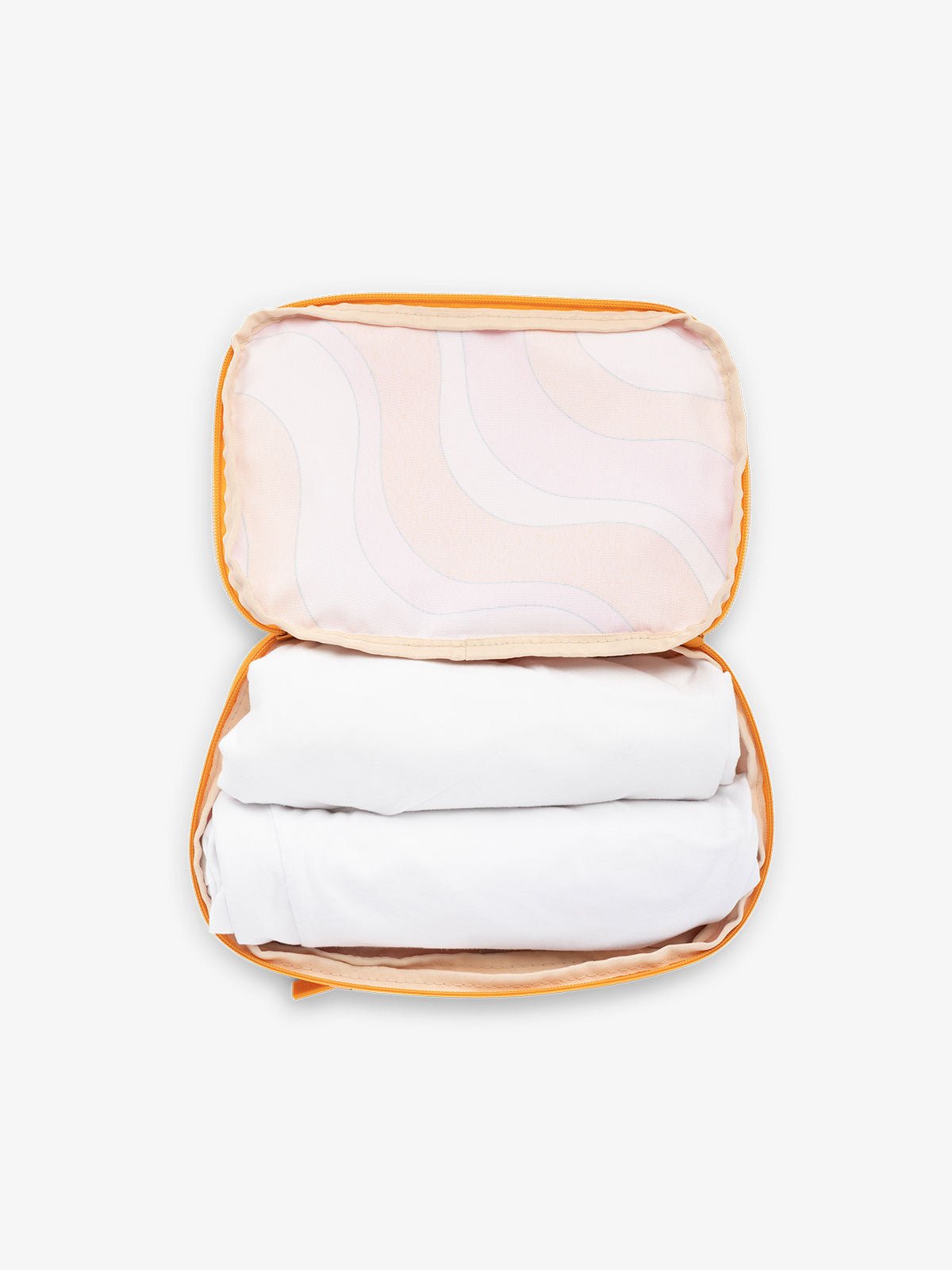 CALPAK small packing cubes for travel made with durable material in retro sunset