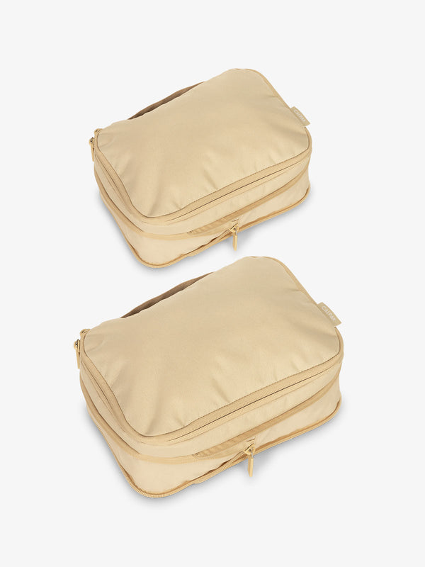 CALPAK small compression packing cubes with top handles and expandable by 4.5 inches in oatmeal