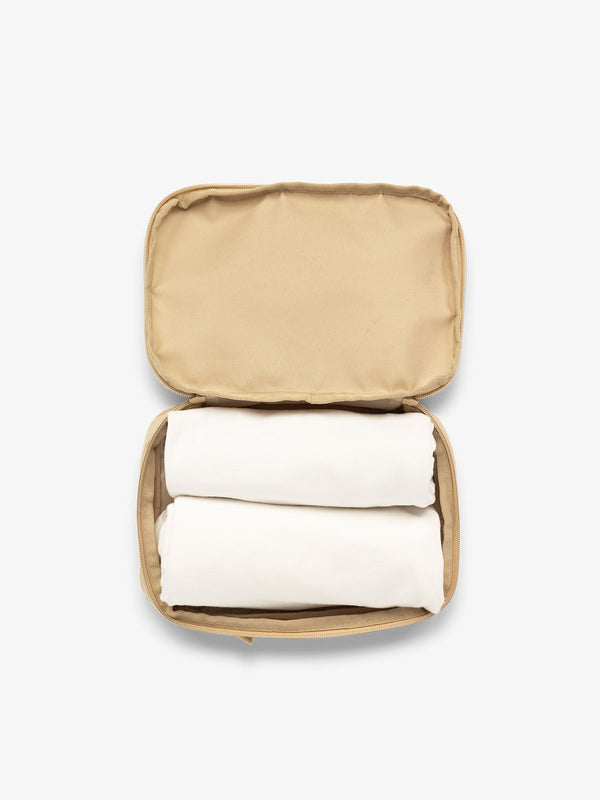 CALPAK small packing cubes for travel made with durable material in beige