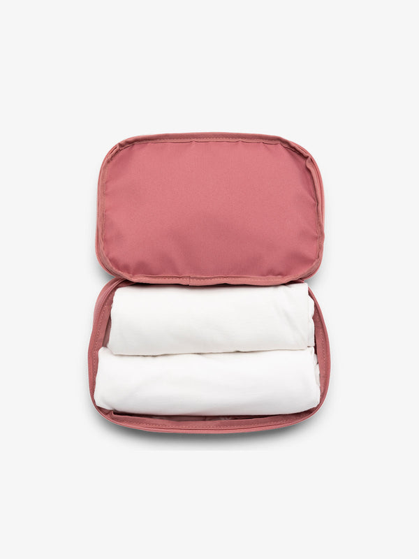 CALPAK small packing cubes for travel made with durable material in pink tea rose