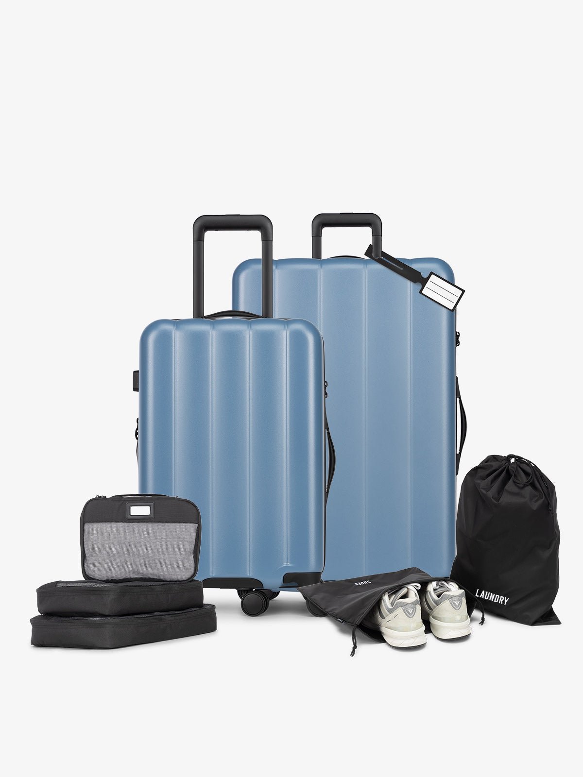 CALPAK Starter Luggage Set with Carry-On, Large Luggage, Packing Cubes, Pouches and Luggage tag in blue