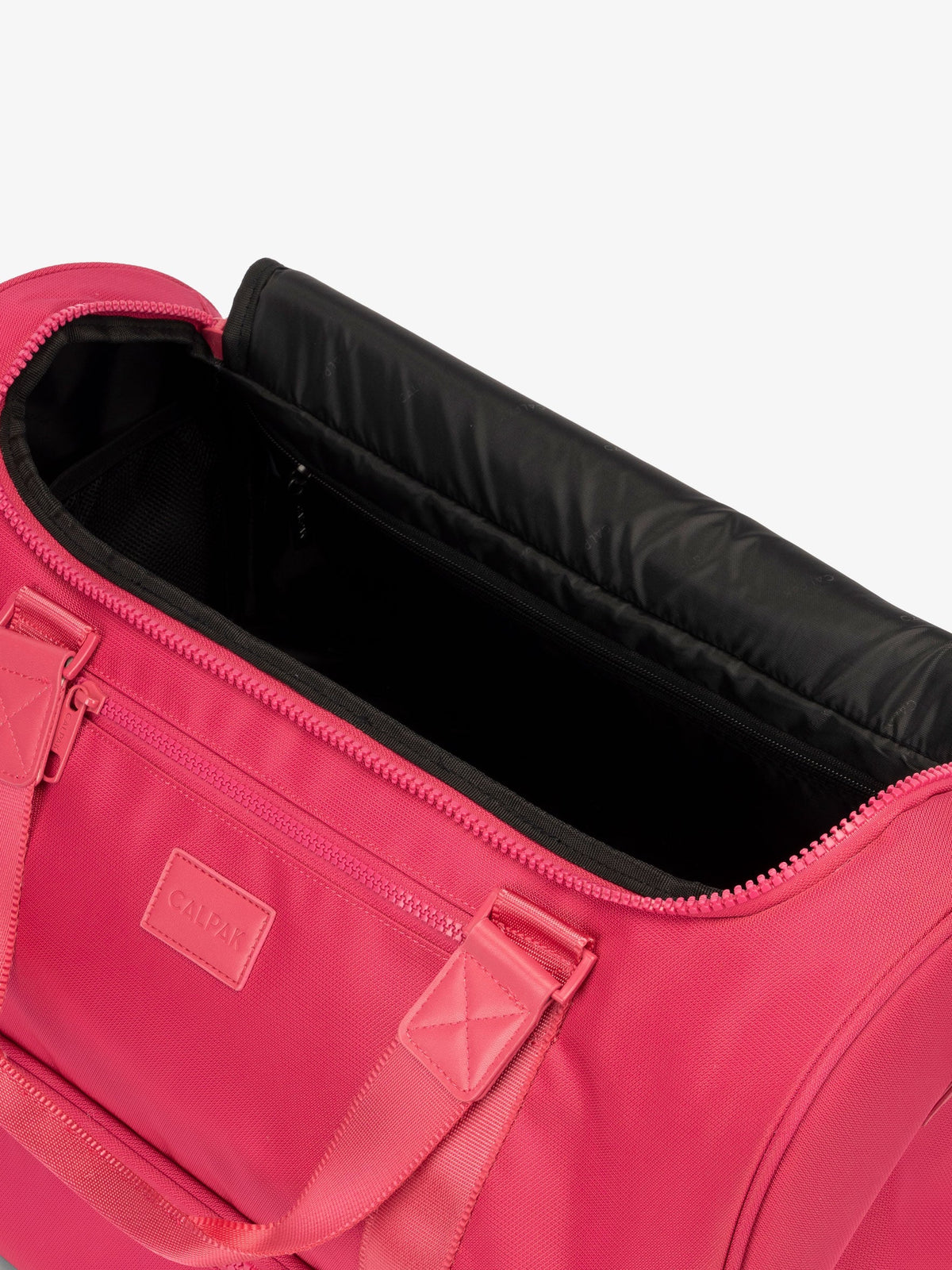CALPAK Stevyn Duffel with multiple interior pockets in dragonfruit; DST7019-DRAGONFRUIT