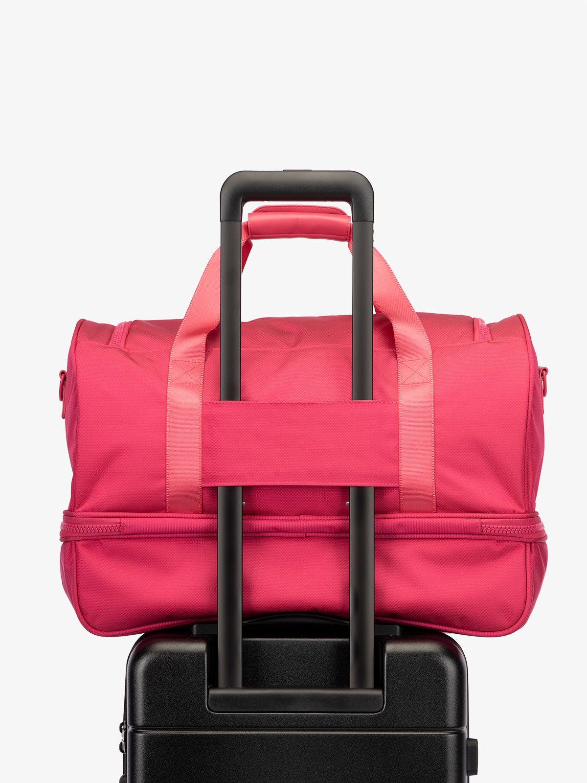 CALPAK Stevyn Duffel with trolley sleeve in hot pink; DST7019-DRAGONFRUIT
