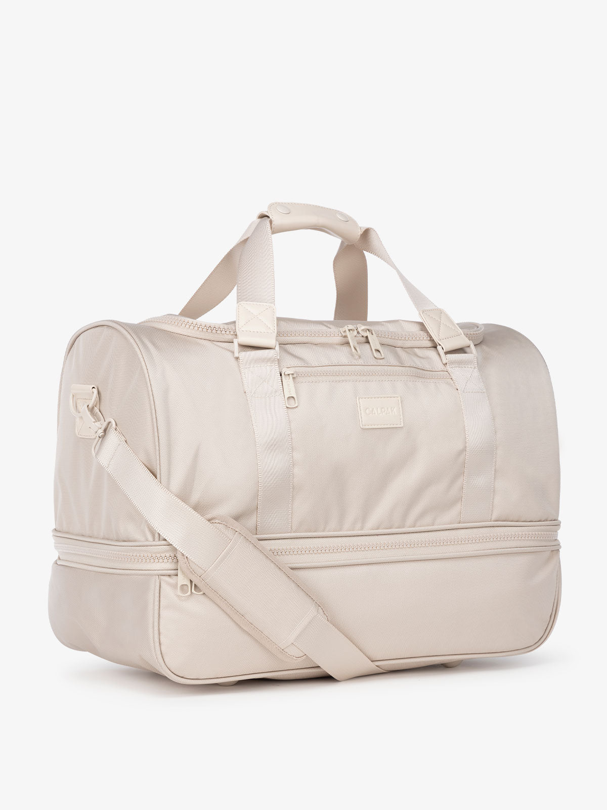 CALPAK Stevyn duffel bag and weekender in cream dune; DST7019-DUNE