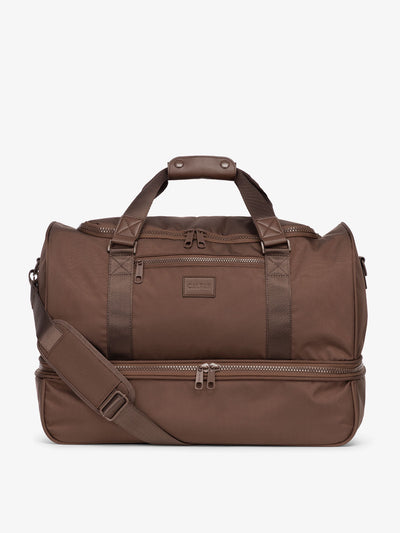 CALPAK Stevyn Duffel bag with removable crossbody strap; in walnut; DST7019-WALNUT view 1