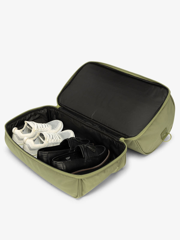CALPAK Stevyn Duffel bag with bottom shoe compartment for travel in green pistachio