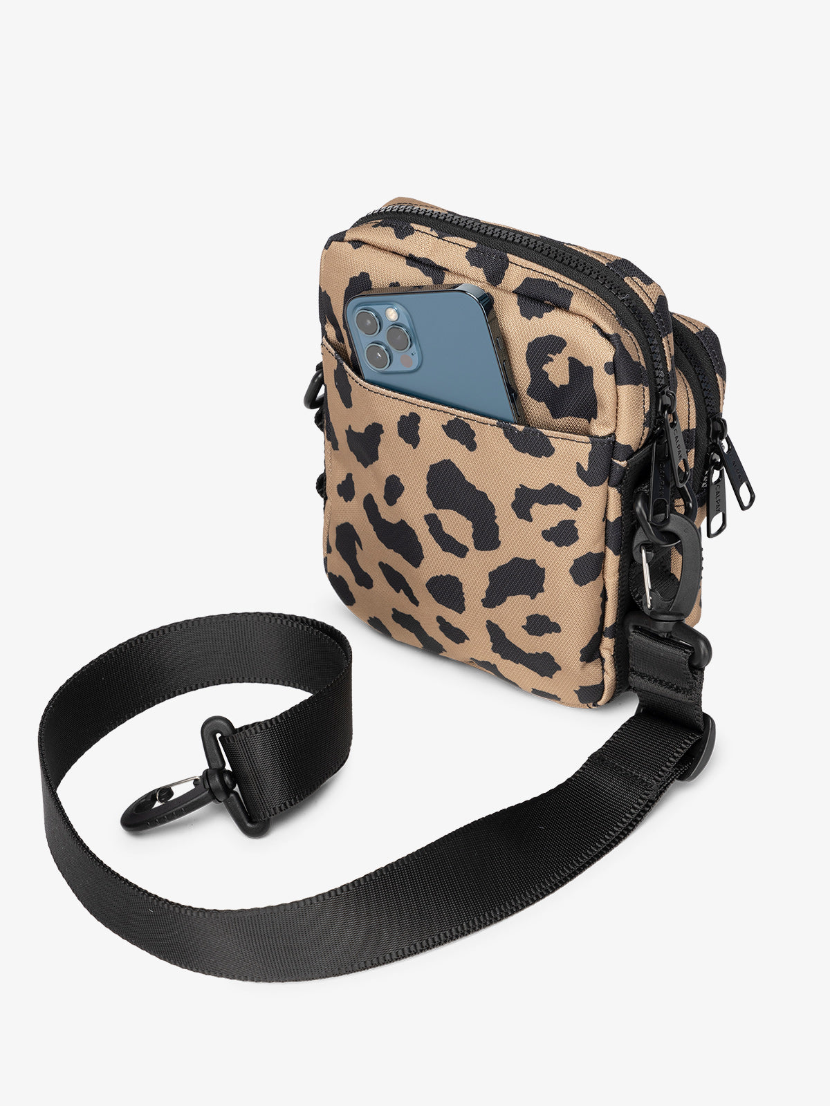Back-view of cheetah CALPAK Stevyn Mini Crossbody Bag with back-slip pocket for cell phone or other belongings