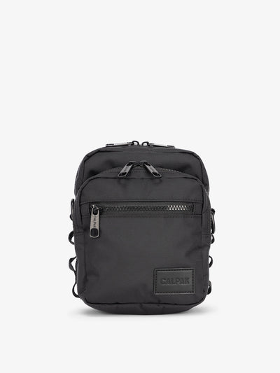 Front-view of CALPAK Stevyn Mini Crossbody Bag in black; ACS2301-BLACK view 1