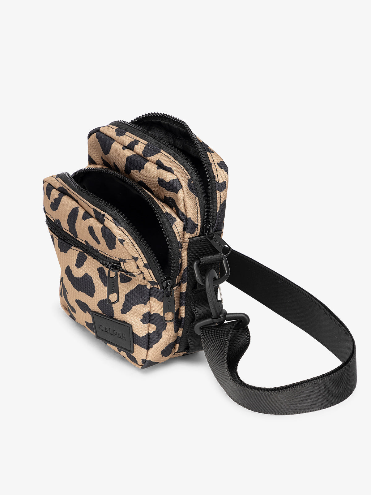 Cheetah CALPAK Stevyn Mini Crossbody Bag with adjustable shoulder strap, zippered pockets, and interior zipper pocket