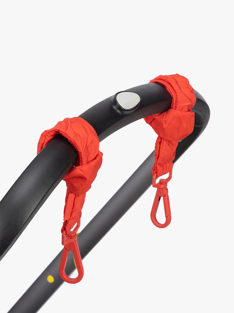 Application on stroller the CALPAK Stroller Straps in red Tomato
