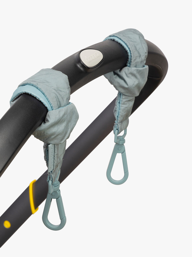 CALPAK Stroller Straps (Set of 2) in light blue Bluebell tied on stroller