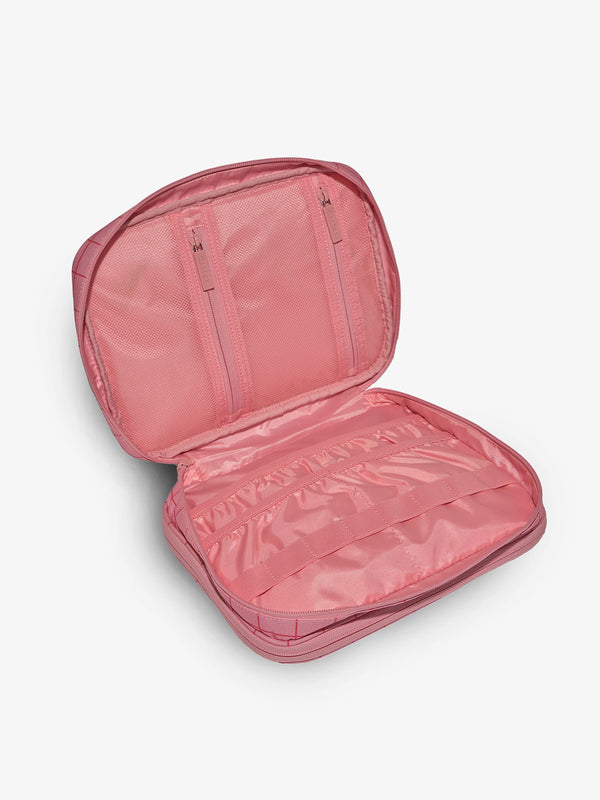 Pink grid tablet tech organizer with multiple zippered pockets for organizing electronics, cords, and belongings