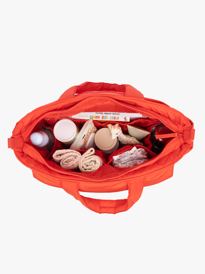 Baby items in CALPAK Diaper Tote bag in red Tomato