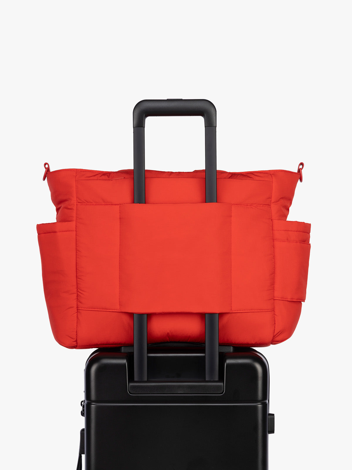Laptop sleeve of CALPAK Diaper Tote bag in red Tomato; TBB2401-TOMATO