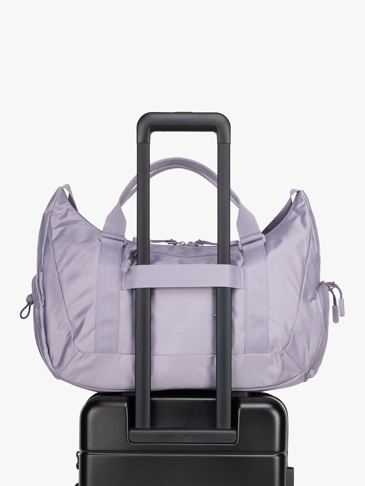 Luggage trolley sleeve for the CALPAK Fit Gym Duffel Bag in purple Iris; TBF2401-IRIS
