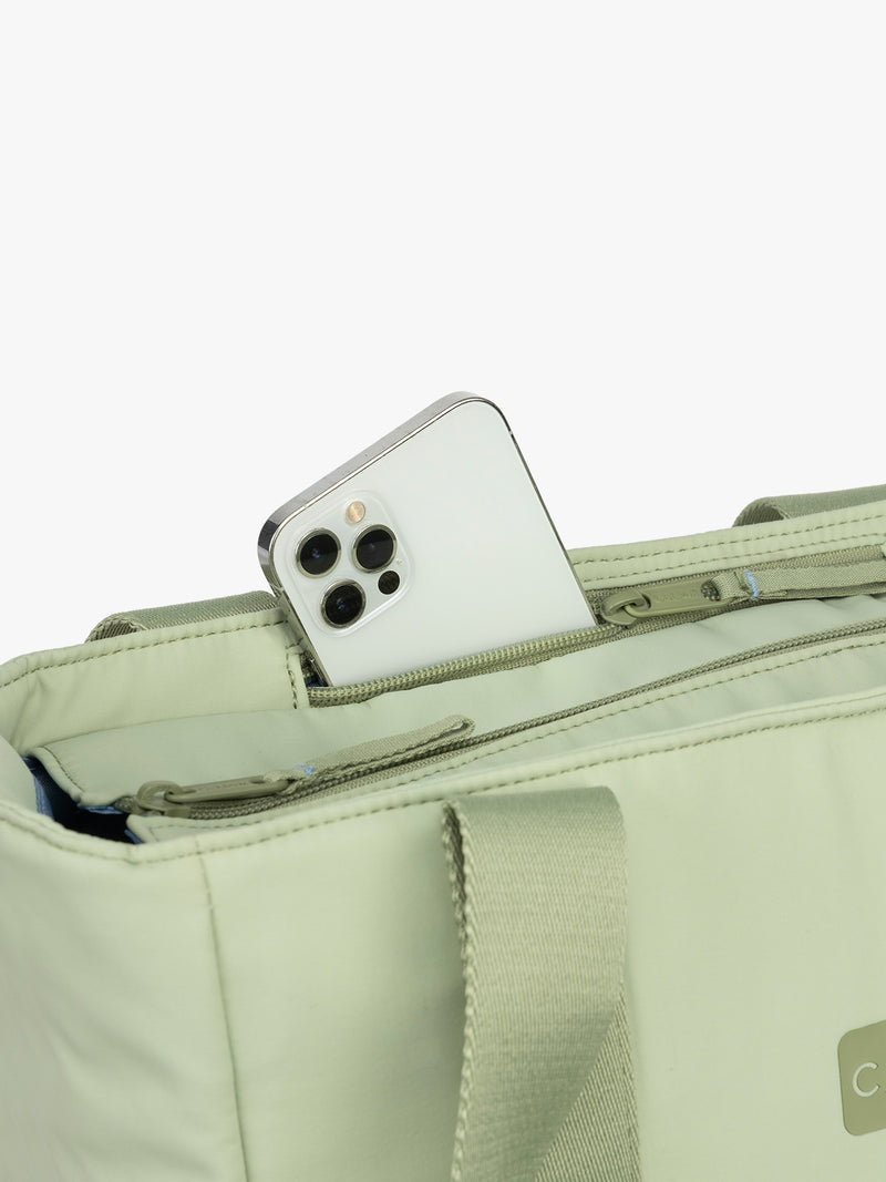 CALPAK Zippered Laptop Tote Bag in light green Meadow on a white background with phone pocket