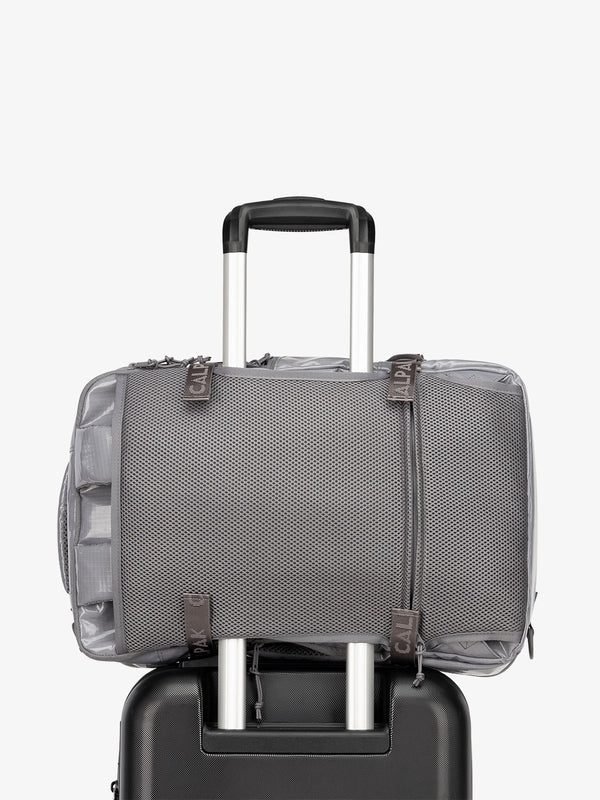 CALPAK Terra 26L Laptop Backpack Duffel with luggage trolley sleeve in gray storm