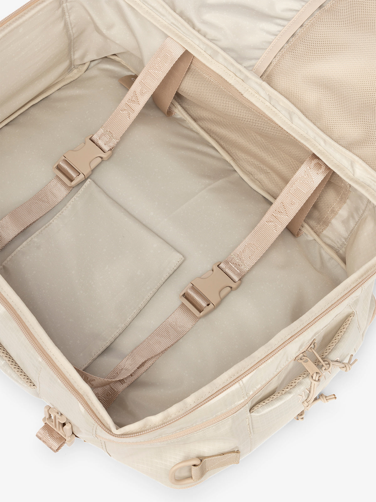 CALPAK Terra 26L Laptop Backpack Duffel with compression straps and multiple interior pockets in beige; BPH2201-WHITE-SANDS