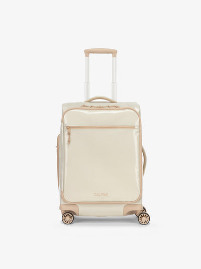 Studio product shot of front-facing CALPAK Terra 35L Carry-On luggage with soft shell and 360 spinner wheels in white sands beige; LTR1020-WHITE-SANDS view 1