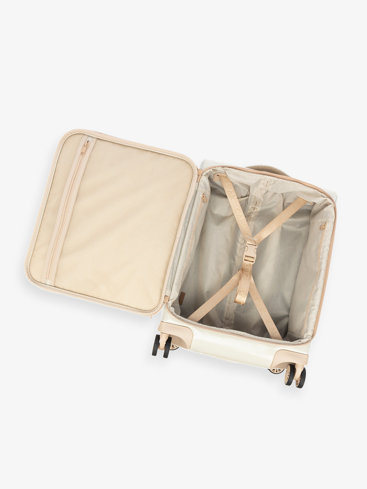Studio product shot of interior compartment of CALPAK Terra 35L Carry-On luggage with soft shell and 360 spinner wheels in beige; LTR1020-WHITE-SANDS