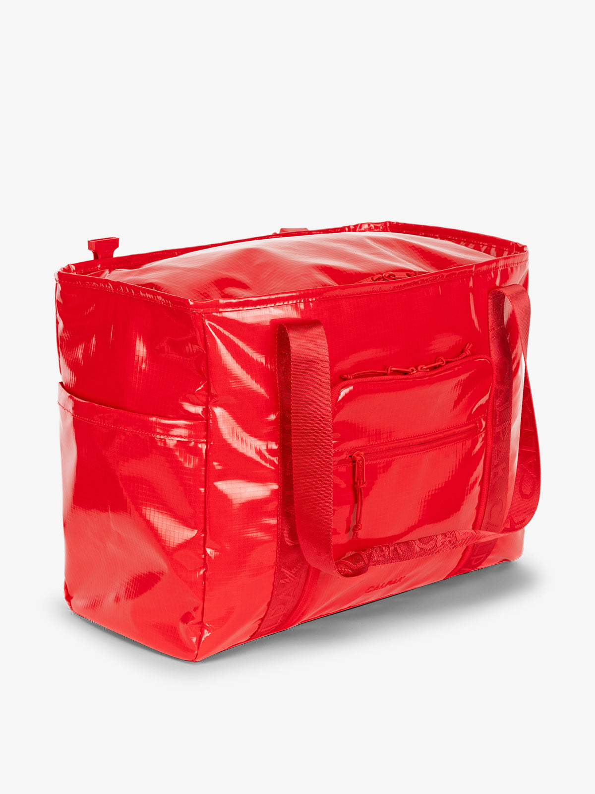 CALPAK Terra 35L Water Resistant Tote Bag in red in side angle; TTO2401-FLAME