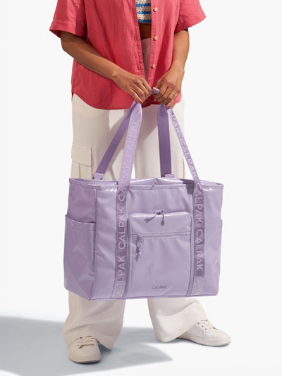 CALPAK Terra 35L Water Resistant Zippered Tote Bag made with durable recycled ripstop exterior, nylon webbing tote straps and multiple exterior pockets in amethyst; TTO2401-AMETHYST