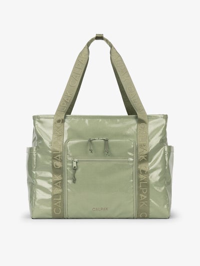 CALPAK Terra 35L Water Resistant Zippered Tote Bag made with durable recycled ripstop exterior, nylon webbing tote straps and multiple exterior pockets in juniper; TTO2401-JUNIPER