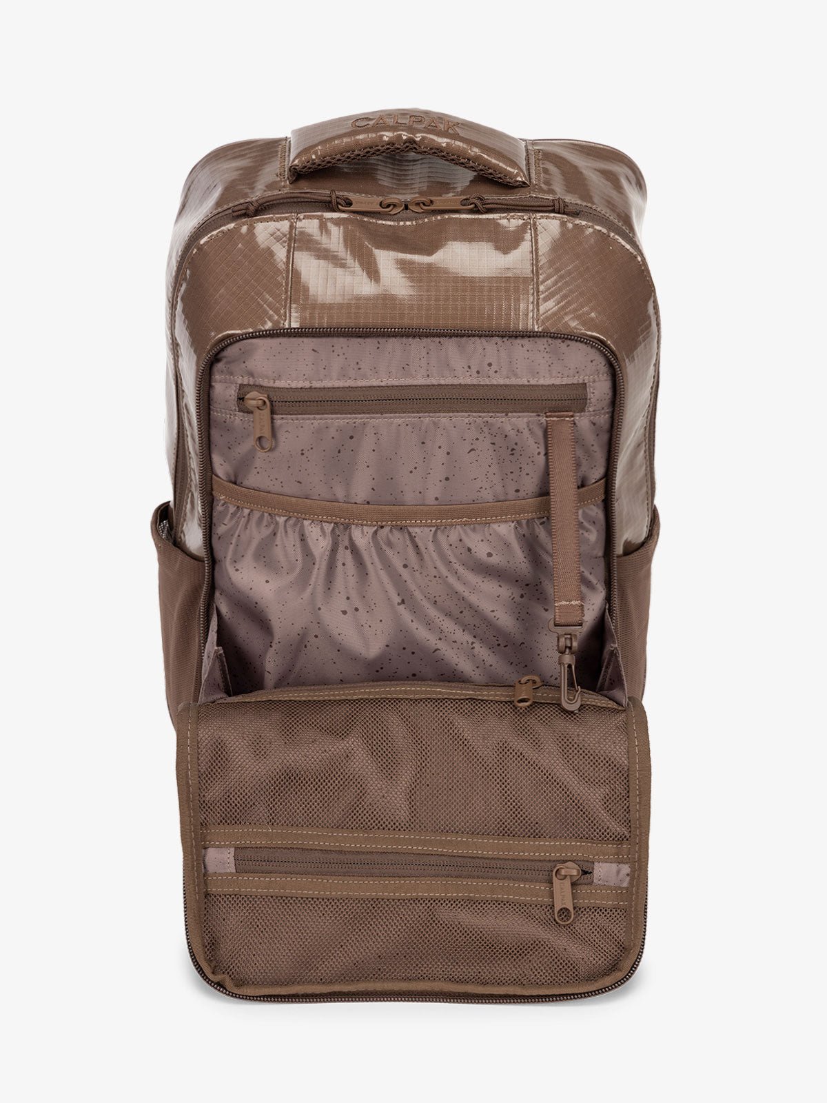 Front organizational panel of CALPAK Terra Hydration Backpack in brown cacao