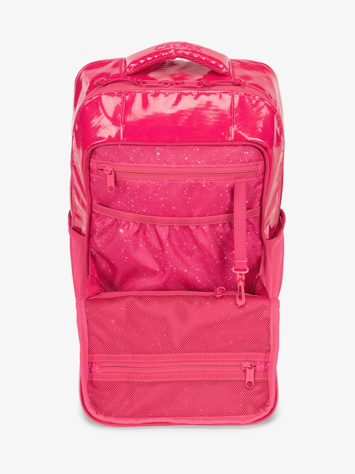 Front organizational panel of CALPAK Terra Hydration Backpack in pink