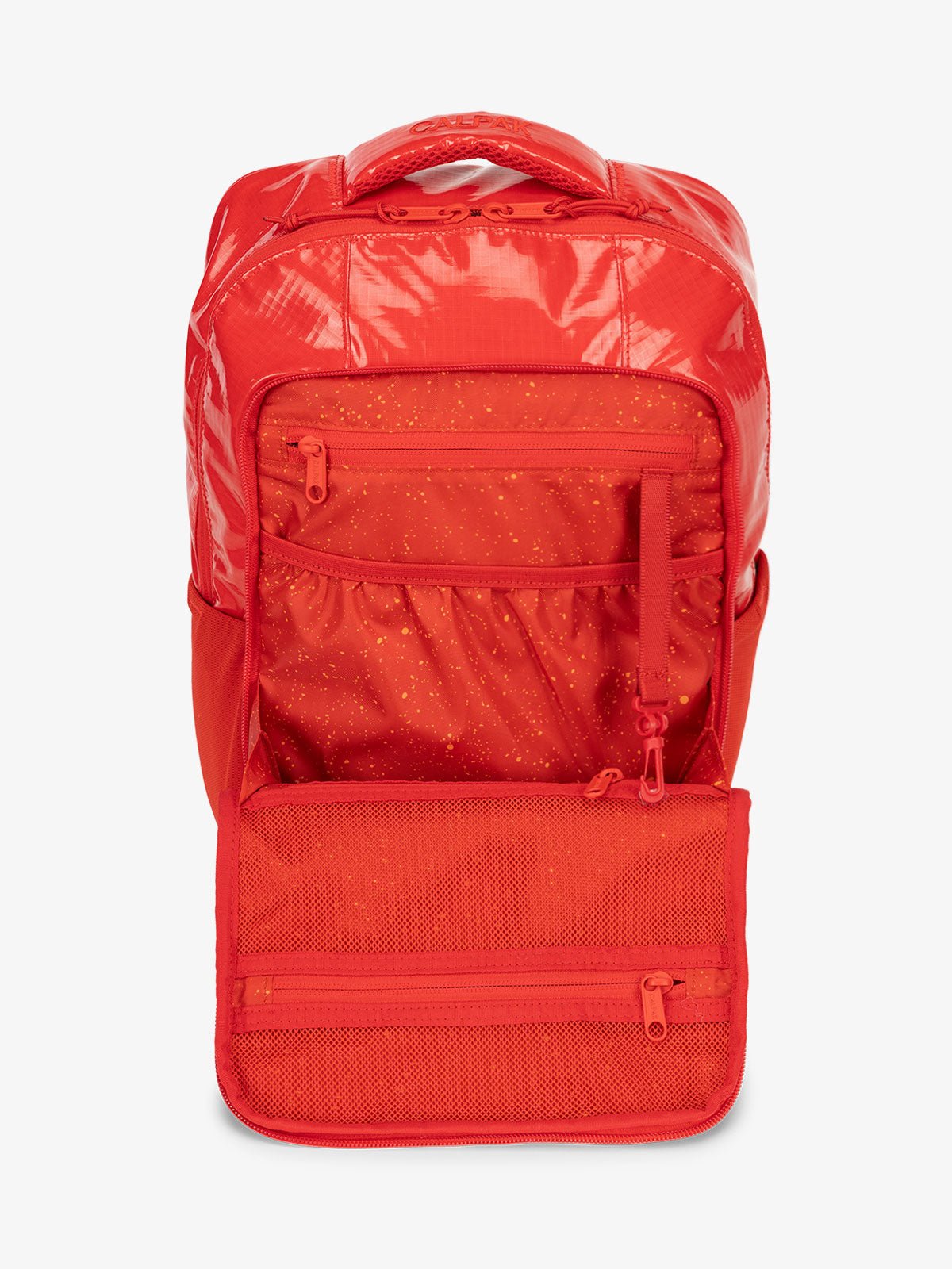 Front organizational panel of CALPAK Terra Hydration Backpack in red