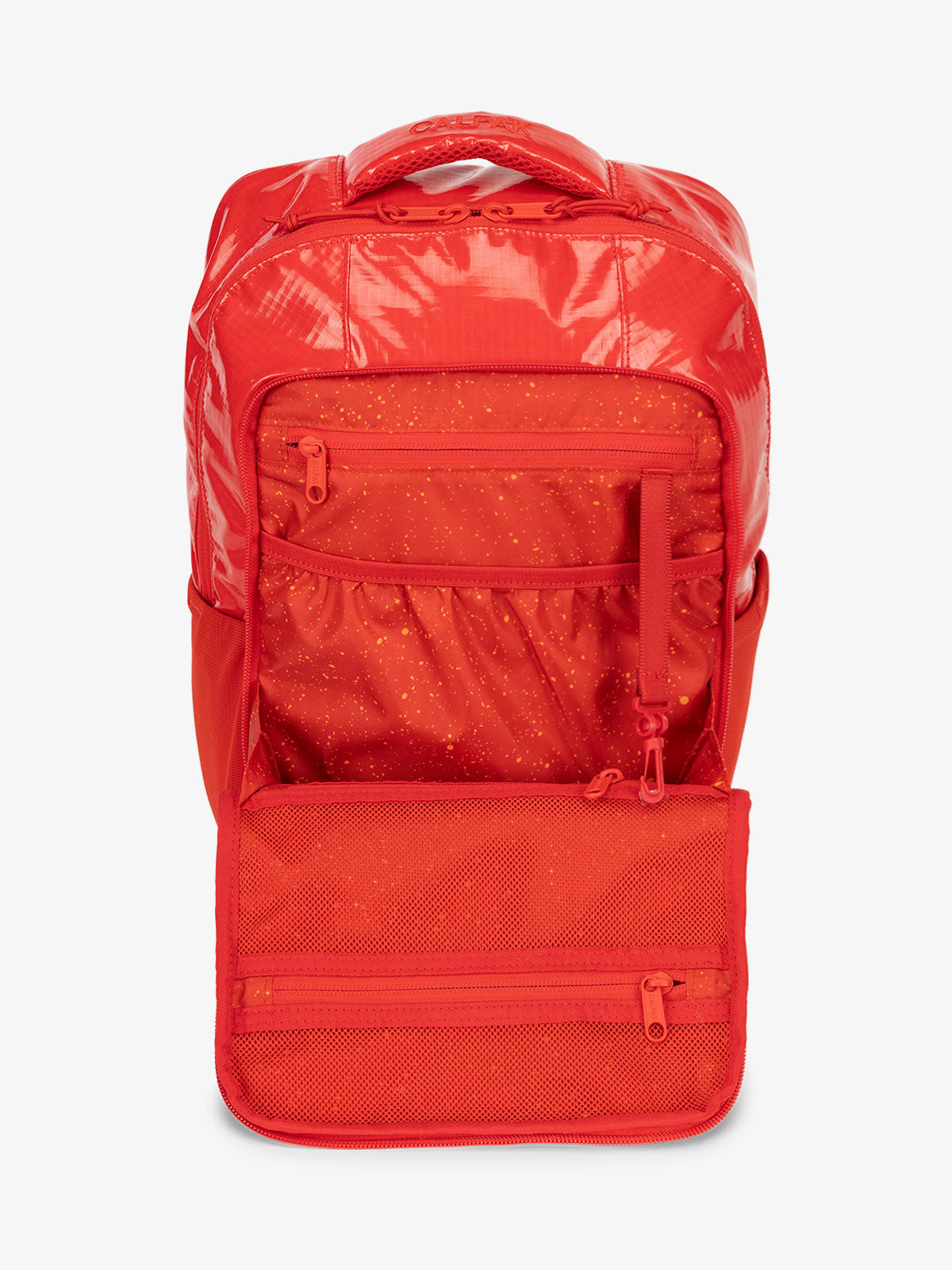 Front organizational panel of CALPAK Terra Hydration Backpack in red; BPT2201-FLAME