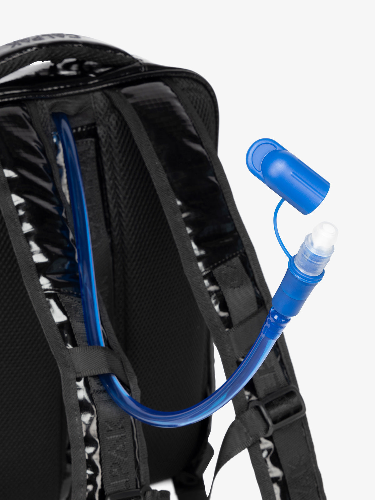 Close up of removable hydration reservoir straw with valve cap in black