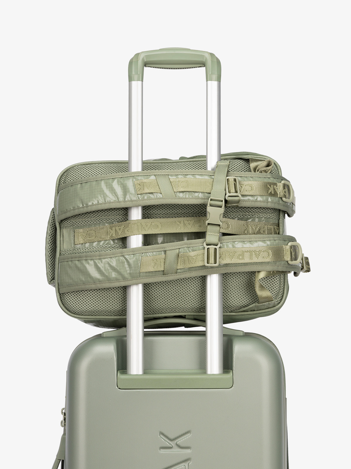 CALPAK hydration backpack with luggage trolley strap and and adjustable shoulder straps in green; BPT2201-JUNIPER